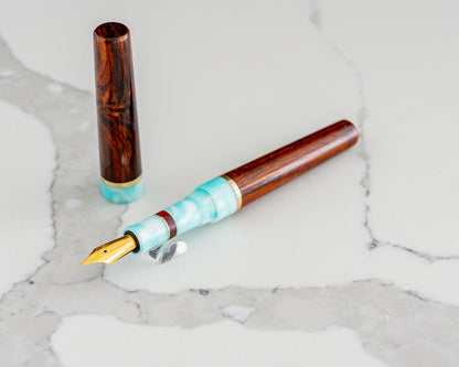 Primary Piece - "Rosewood Skies" | Handmade Cocobolo & Tiffany Blue Resin Fountain Pen w/ Brass & Padauk Accents