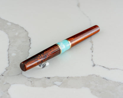 Primary Piece - "Rosewood Skies" | Handmade Cocobolo & Tiffany Blue Resin Fountain Pen w/ Brass & Padauk Accents