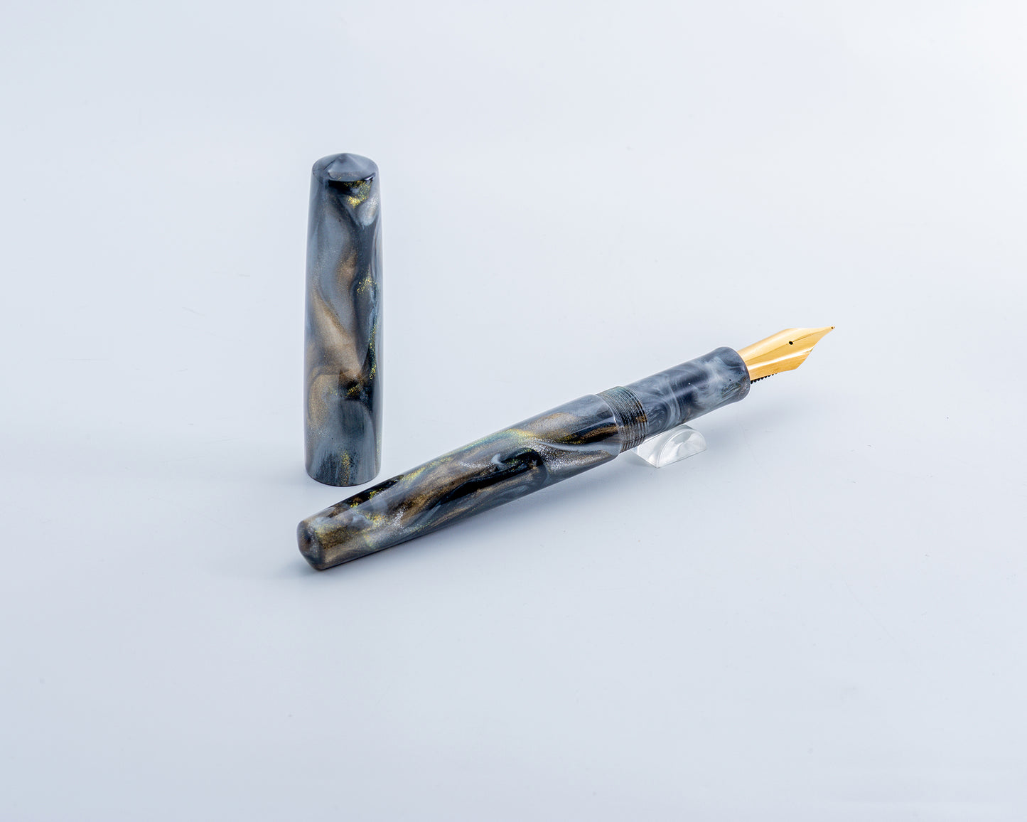 Portly Piece - "Nib Wolf's Ether Ore" | Handmade Alumilite Resin Fountain Pen