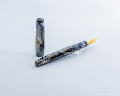 Portly Piece - "Nib Wolf's Ether Ore" | Handmade Alumilite Resin Fountain Pen